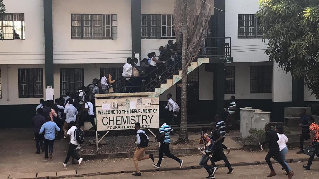 Students rushing to a classroom at FBC campus