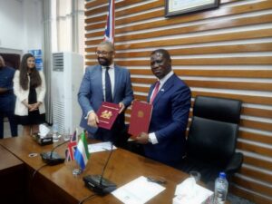 UK's Foreign Secretary, James Cleverly and Sierra Leone's Foreign Minister, Prof. David Francis displayed a signed deal on trade relations between their two countries-Photo Credit Ministry of Information on Facebook.